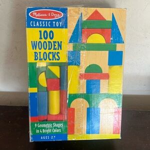 Melissa & Doug block set. Used 1 time, dusty due to sitting in the garage.